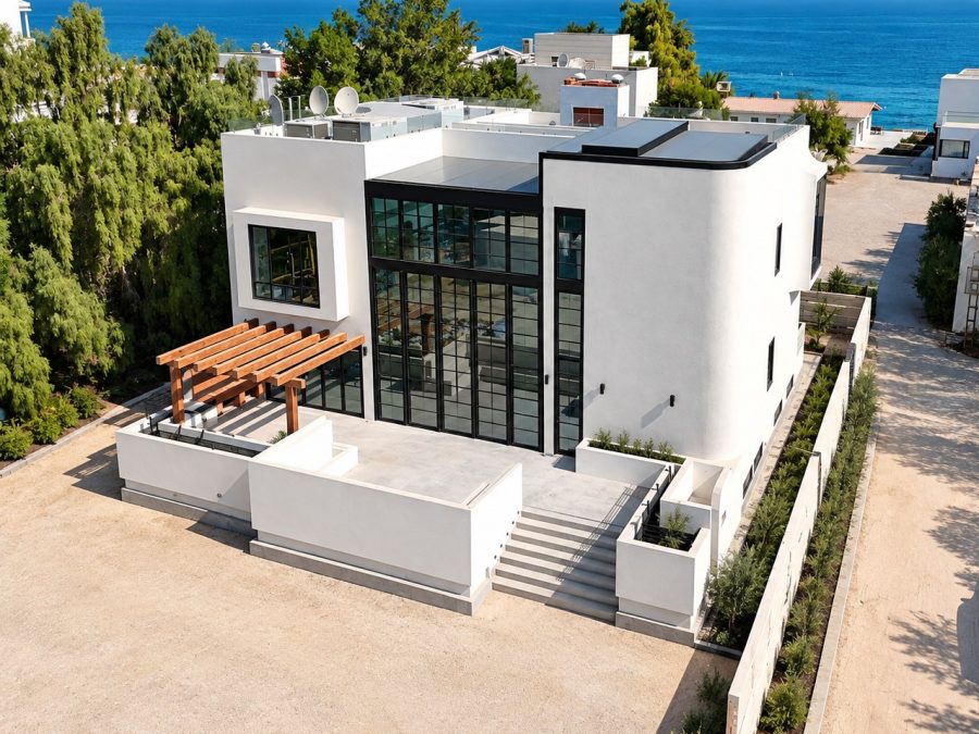 Finished white villa with glazed double-height facade